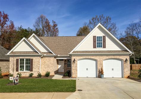 tan brick house metal roof|light tan house colors.